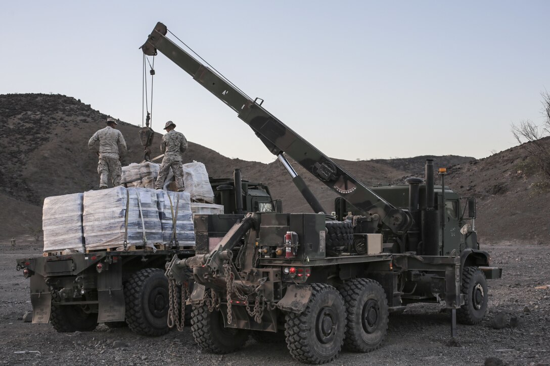 171214-M-QL632-047 DJIBOUTI, Djibouti (Dec. 14, 2017) – U.S. Marines and French military forces prepare to off load supplies in support of Alligator Dagger. Alligator Dagger, led by Naval Amphibious Force, Task Force 51/5th Marine Expeditionary Expedition Brigade, is a dedicated, bilateral combat rehearsal that combines U.S. and French forces to practice, rehearse and exercise integrated capabilities available to U.S. Central Command both afloat and ashore. (U.S. Marine Corps photo by Staff Sgt. Vitaliy Rusavskiy/Released)