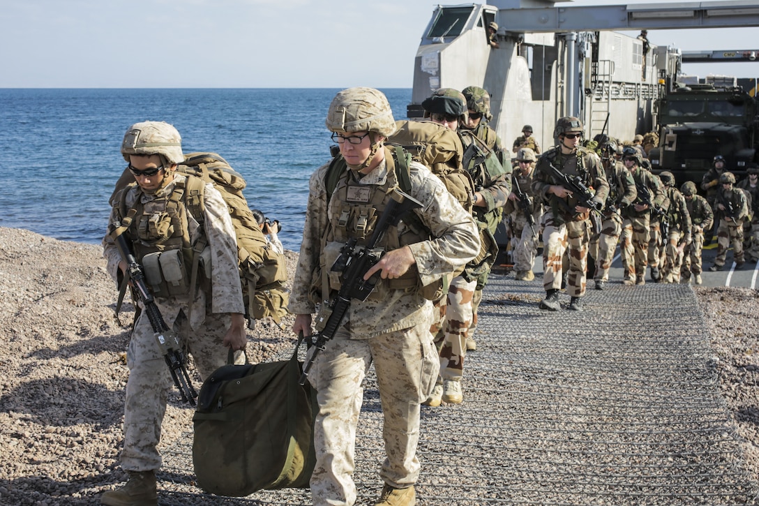 171210-M-QL632-085 DJIBOUTI, Djibouti (Dec. 14, 2017) – U.S. Marines and French military forces disembark a French roll-on/roll-off catamaran landing craft during Alligator Dagger. Alligator Dagger, led by Naval Amphibious Force, Task Force 51/5th Marine Expeditionary Expedition Brigade, is a dedicated, bilateral combat rehearsal that combines U.S. and French forces to practice, rehearse and exercise integrated capabilities available to U.S. Central Command both afloat and ashore.