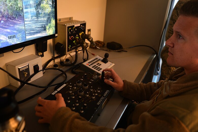 U.S. Air Force Senior Airmen Jake Day, 20th Civil Engineer Squadron explosive ordnance disposal (EOD) journeyman, reviews a dummy improvised explosive device site utilizing an Air Force Medium-Sized Robot (AFMSR) control center at Shaw Air Force Base, S.C., Dec. 14, 2017.