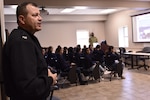 Retired Navy Capt. Scott Evertson, senior naval science instructor for the George Bush High School Navy Junior Reserve Officer Training Corps (NJROTC) unit near Houston, Texas, speaks to his NJROTC cadets following a Navy Medicine overview presentation from Lt. Cmdr. Sarah Gentry. Forty-two students visited Navy Medicine Training Support Center (NMTSC) in San Antonio, Texas, to receive a basic orientation to the Navy and to represent the more than 200-member George Bush High School NJROTC unit in the Sea Dragon Classic Drill Meet at Southwest High School in San Antonio.