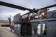 Airmen from the 723d Aircraft Maintenance Squadron (AMXS), perform maintenance on a HH-60G Pave Hawk, Dec. 15, 2017, at Moody Air Force Base, Ga. Members from the 723d Aircraft Maintenance Squadron (AMXS) and 23d Civil Engineer Squadron (CES) participated in a training day to help improve their readiness and get extra practice at their crafts. The AMXS performed maintenance on helicopters and the CES conducted rescue operations by extinguishing a mock fire within an HH-60G Pave Hawk and extracting injured victims. (U.S. Air Force photo by Airman Eugene Oliver)