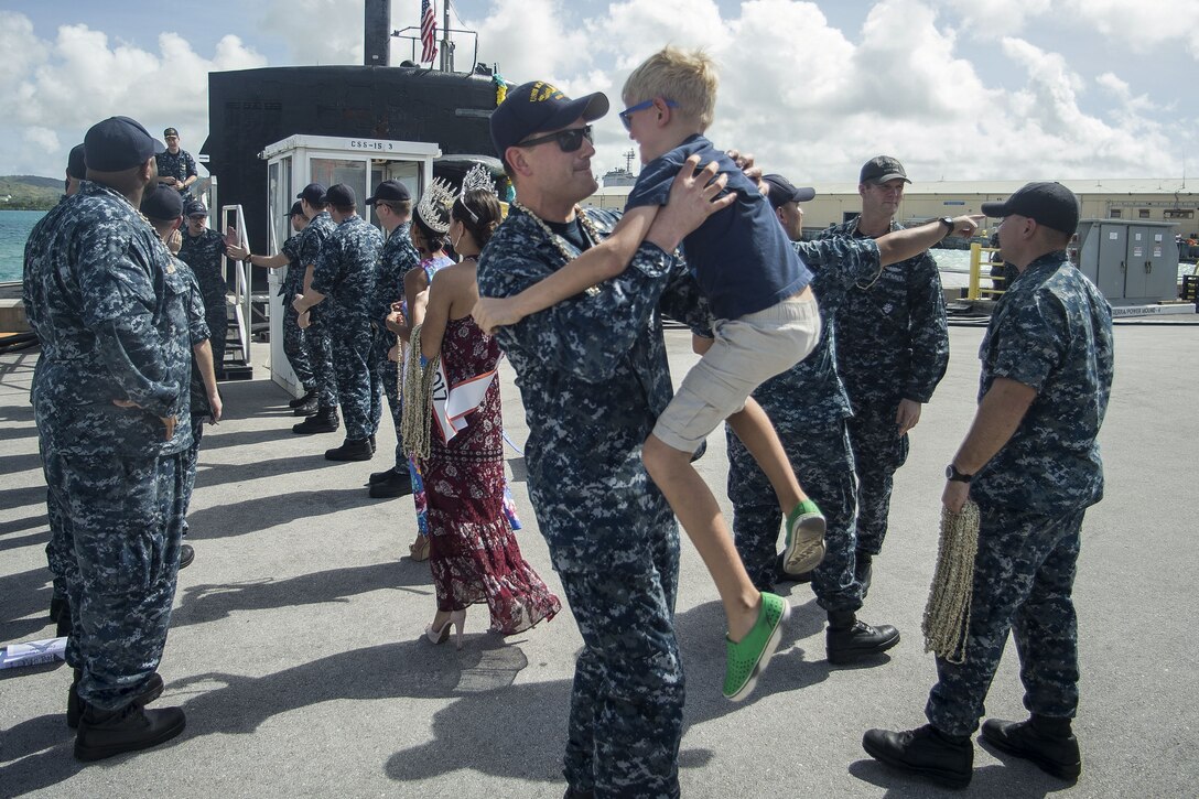 A sailor reunites with his son.