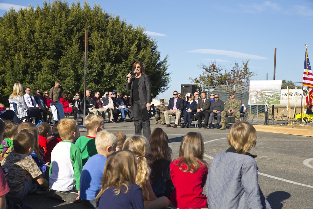 Candace Singh, superintendent of the Fallbrook School District, speaks to the students of San Onofre Elementary School about the improvements of the new school being built during the groundbreaking ceremony aboard Camp Pendleton, Calif., Dec. 14, 2017. The school will enroll 900 students, have computer labs with wireless internet, and a improved science, technology, engineering, mathematics program. (U.S. Marine Corps photo by Pfc. Drake Nickels)