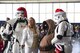 Volunteers dressed as “Star Wars” characters pose with a Project Toy Drop volunteer during Maxwell’s Project Toy Drop, Dec. 16, 2017, Maxwell Air Force Base, Ala.  Project Toy Drop promotes positivity and brings joy to struggling families.   (U.S. Air Force photo by Daniella Peña)