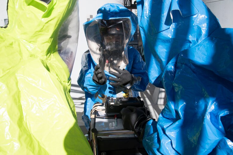 Airmen from the 23d Medical Group Bioenvironmental Engineering Flight and 23d Civil Engineer Squadron Emergency Management Flight setup a chemical identifier to recognize leaking hazardous materials during an exercise, Dec. 13, 2017, in Valdosta, Ga. Fire departments from Lowndes County, Valdosta, Tifton and Albany, the 23d Civil Engineer Squadron’s Fire Department and Emergency Management Flights, and 23d Medical Group Bioenvironmental Engineering Flight responded to the aftermath of a simulated tornado hitting the Du Pont Crop Protection factory. (U.S. Air Force photo by Staff Sgt. Eric Summers Jr.)