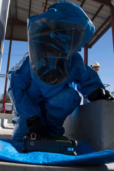 Airman 1st Class Briana Mciver, 23d Medical Group Bioenvironmental Engineering Flight apprentice, processes a chemical sample inside of simulated quarantine zone during an exercise, Dec. 13, 2017, in Valdosta, Ga. Fire departments from Lowndes County, Valdosta, Tifton and Albany, the 23d Civil Engineer Squadron’s Fire Department and Emergency Management Flights, and 23d Medical Group Bioenvironmental Engineering Flight responded to the aftermath of a simulated tornado hitting the Du Pont Crop Protection factory. (U.S. Air Force photo by Staff Sgt. Eric Summers Jr.)