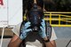Airman 1st Class Briana Mciver, 23d Medical Group Bioenvironmental Flight apprentice, removes her mask during decontamination, Dec. 13, 2017, in Valdosta, Ga. Fire departments from Lowndes County, Valdosta, Tifton and Albany, the 23d Civil Engineer Squadron’s Fire Department and Emergency Management Flights, and 23d Medical Group Bioenvironmental Engineering Flight responded to the aftermath of a simulated tornado hitting the Du Pont Crop Protection factory. (U.S. Air Force photo by Staff Sgt. Eric Summers Jr.)