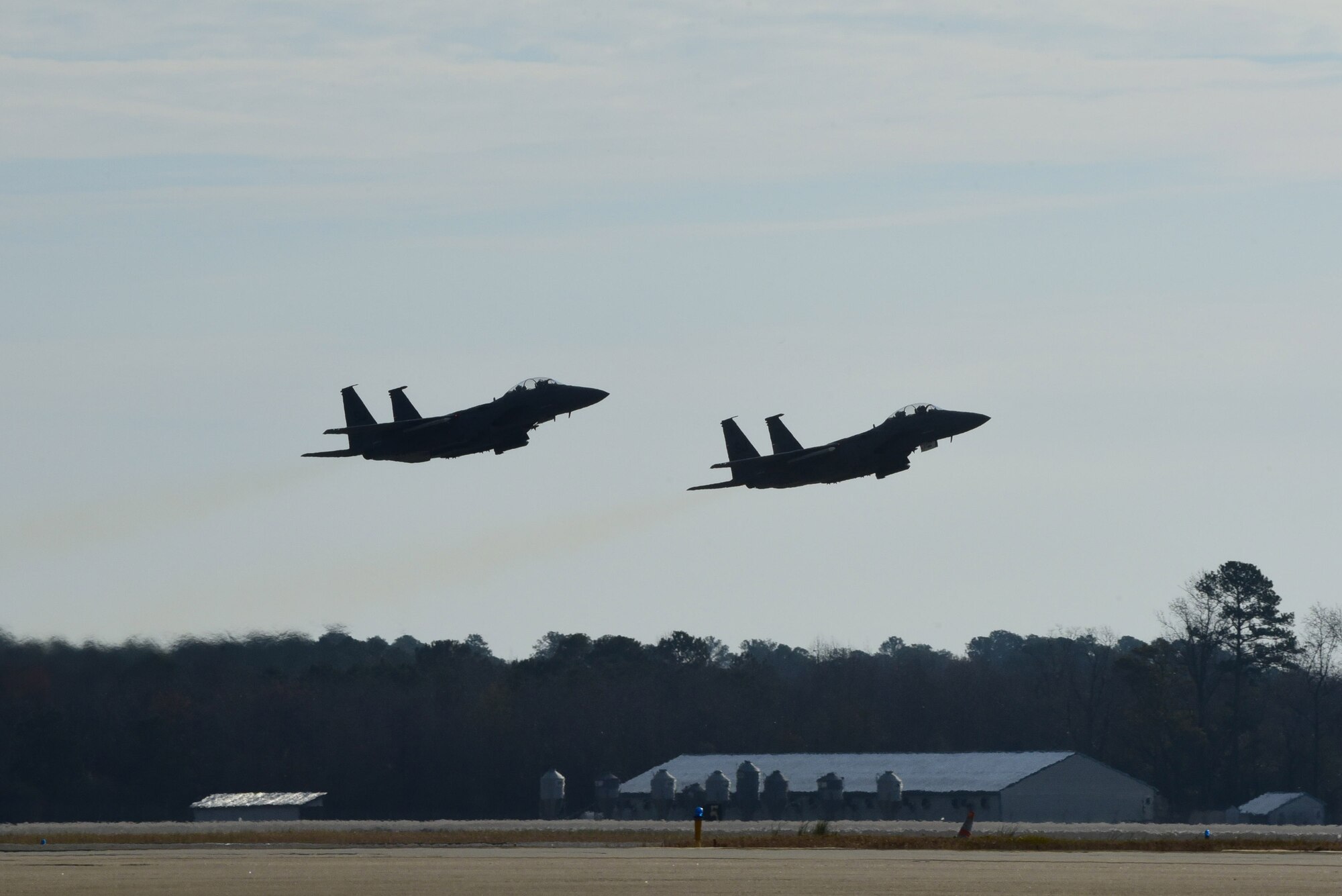 Two F-15E Strike Eagles depart the runway during exercise Razor Talon Dec. 15, 2017, at Seymour Johnson Air Force Base, North Carolina.