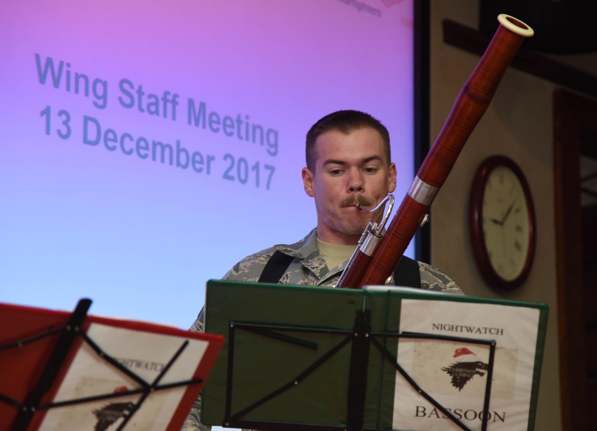 Airman 1st Class Burton Fowler, The U.S. Air Force Band of the West, Nightwatch bassoonist, performs with The U.S. Air Force Band of the West, Nightwatch, during the 81st Training Wing staff meeting at Stennis Hall Dec. 13, 2017, on Keesler Air Force Base, Mississippi. During the two-day visit to Keesler the band performed for Airmen and local residents throughout various locations at Keesler and the nearby area. Their mission is to honor military heritage through music, connect with the American public and inspire patriotism and excellence. (U.S. Air Force photo by Kemberly Groue)