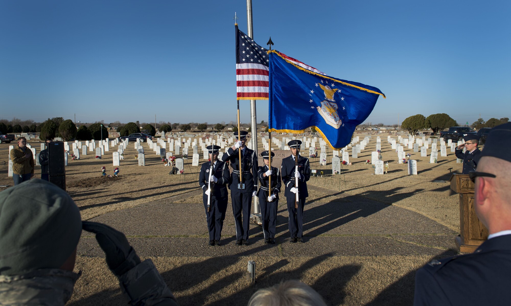 U.S. Air Force Airmen from the Altus Air Force Base Honor Guard present the colors during a Wreaths Across America ceremony at the Altus Cemetery, Okla., Dec. 16, 2017.