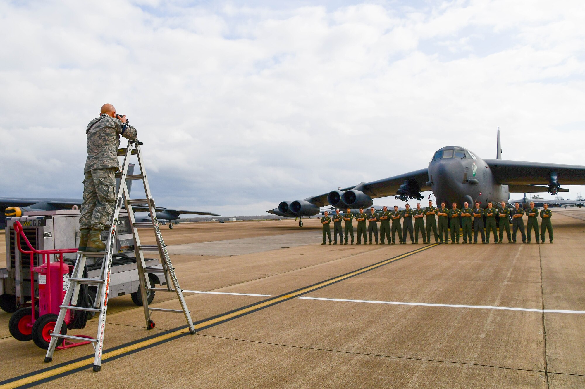 Formal Training Unit class 17-02 stand in front of a B-52 Stratofortress on Barksdale Air Force Base, La. Dec. 4, 2017.