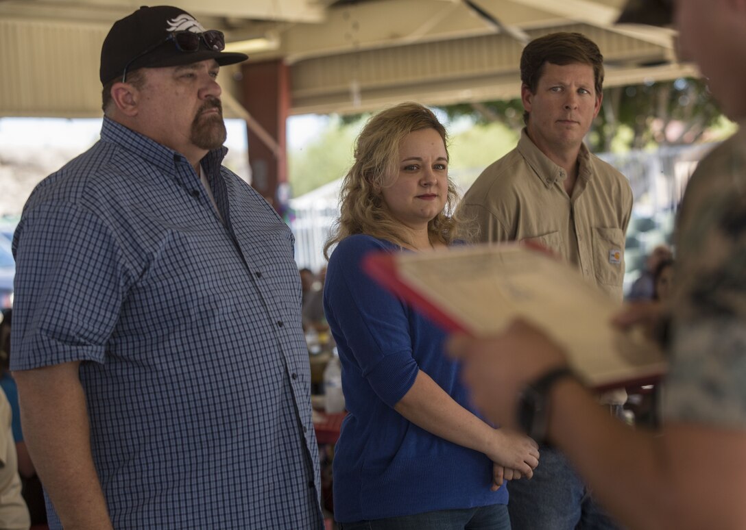 Members of the Civilian Employee Welfare Recreation Association celebrate the Marine Corps Air Station Yuma 2017 Employee of the Year at the MCAS Yuma, Ariz., Picnic Pavilion Oct. 26, 2017. This annual event is organized in appreciation of the civilian employees on the station. (U.S. Marine Corps photo by Lance Cpl. Sabrina Candiaflores)