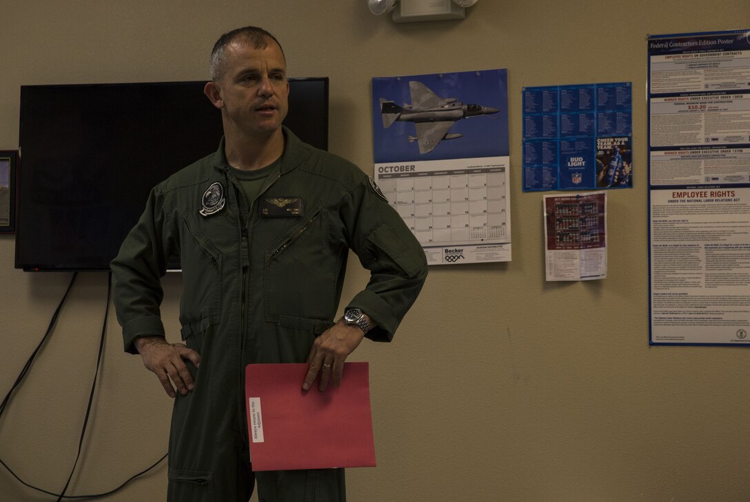 U.S. Marine Corps Col. James B. Wellons, the commanding officer of Marine Aviation Weapons and Tactics Squadron (MAWTS) One speaks to the Fuel Branch personnel at the Fuel Brance office on Marine Corps Air Station Yuma, Ariz., Oct. 26, 2017. The Fuel Branch supported MAWTS-1 in their efforts to provide standardized advanced tactical training during Weapons and Tactics Instructor courses twice a year in addition to daily routines and supporting other squadrons visiting or on station. (U.S. Marine Corps photo taken by Cpl. Christian Cachola)