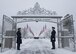 Two members of the Fairchild Air Force Base Honor Guard stand at the entrance during an annual wreath laying ceremony at Fort George Wright Cemetery, Washington, Dec. 16, 2017. The Honor Guard is an ever-present part of military ceremonies, serving to uphold the traditions of honoring those that serve. (U.S. Air Force photo/Senior Airman Ryan Lackey)