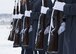 Several members of the Fairchild Air Force Base Honor Guard hold their rifles at “present arms” during an annual wreath laying ceremony at Fort George Wright Cemetery, Washington, Dec. 16, 2017. It is customary at military funerals for Honor Guard to perform a three-rifle volley and play Taps. (U.S. Air Force photo/Senior Airman Ryan Lackey)