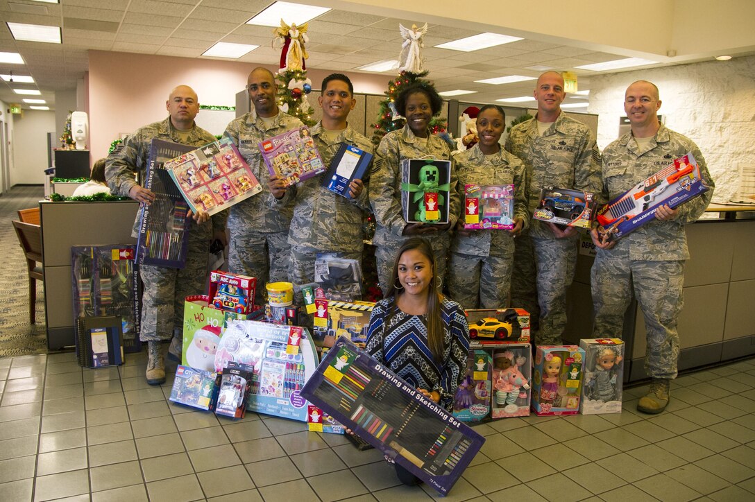 Hawaii First Sergeants teamed up with Hickam Federal Credit Union for the 2017 Angel Tree program, Joint Base Pearl Harbor-Hickam, Hawaii, Dec. 18, 2017. The Angel Tree program is a seasonal charitable program ran by members of Operation Warmheart that provides monetary assistance and gifts to Airmen. (U.S. Air Force photo by Tech. Sgt. Heather Redman)