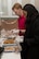 Kiyana Kemp, United Service Organizations Yokota center manager, and Nathan Evans, USO field program manager, bag cookies to be passed out to service members for the USO’s Cookie Caravan, Dec. 14, 2017, Yokota Air Base, Japan.