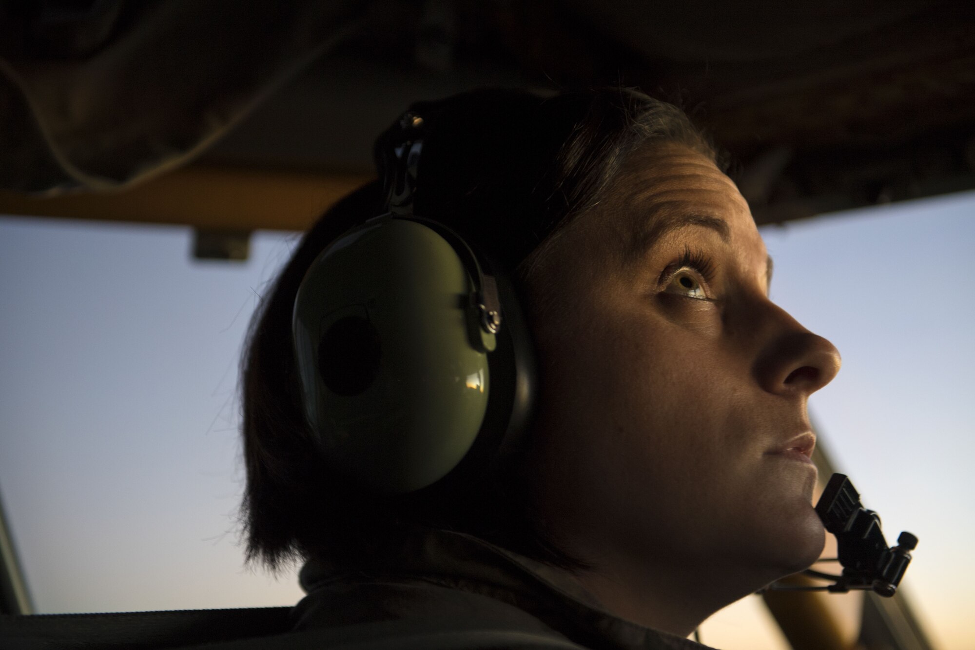 U.S. Air Force Maj. Kirsten Ellis, a Pilot assigned to 447th Air Expeditionary Group, inspects aircraft instruments on board a KC-135 Stratotanker during a refueling mission over Syria Dec. 1, 2017. The 447th AEG supports Operation Inherent Resolve by conducting refueling, close air support missions with KC-135 Stratotankers and A-10 Thunderbolt IIs along with aircraft maintenance located at Incirlik Air Base, Turkey. (U.S. Air Force photo by Staff Sgt. Paul Labbe)