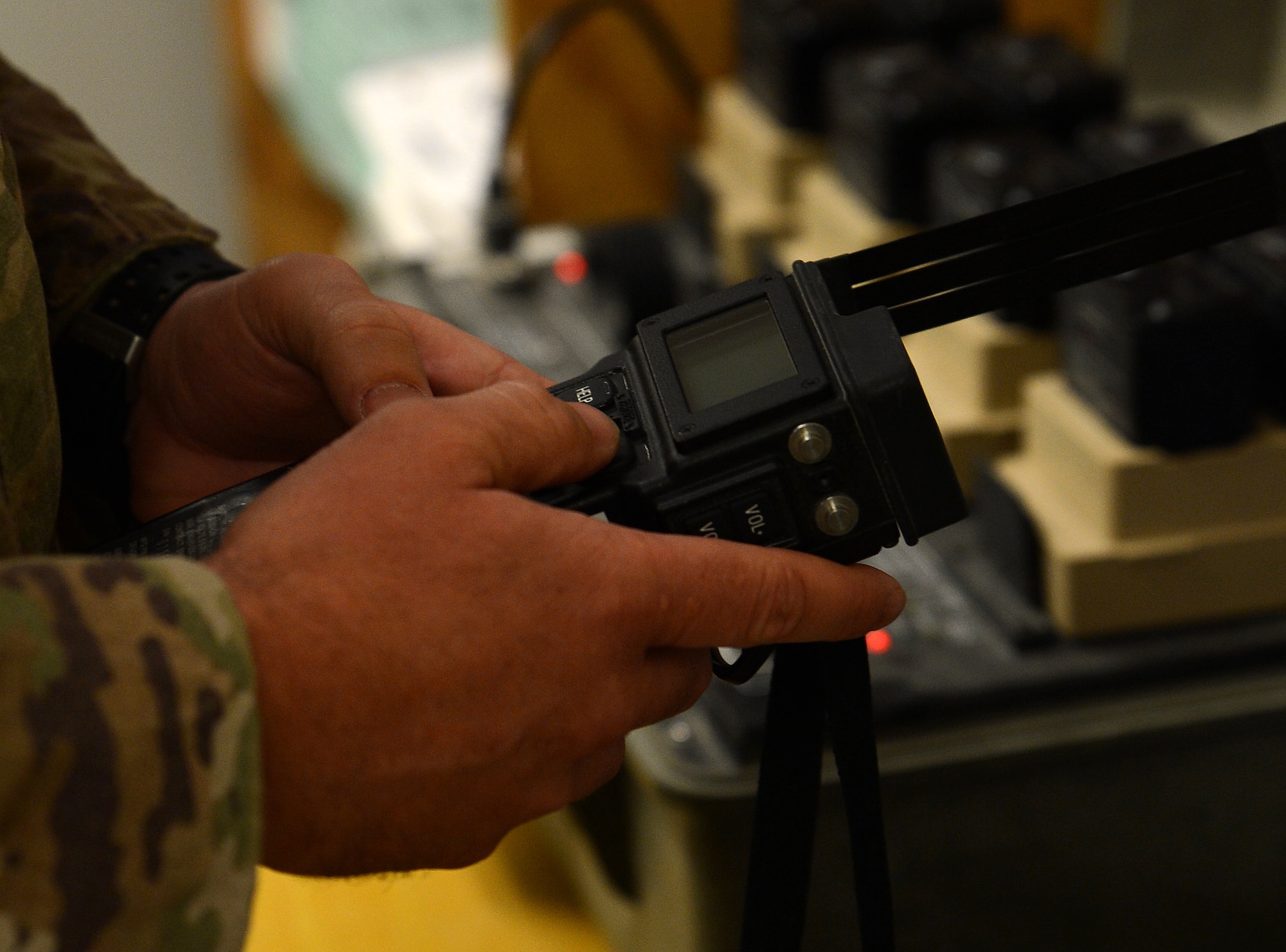 Tech. Sgt. Andrew Blackmon, 430th Expeditionary Electronic Combat Squadron aircrew flight equipment technician, checks the survival radios Nov. 28, 2017 at Kandahar Airfield, Afghanistan.