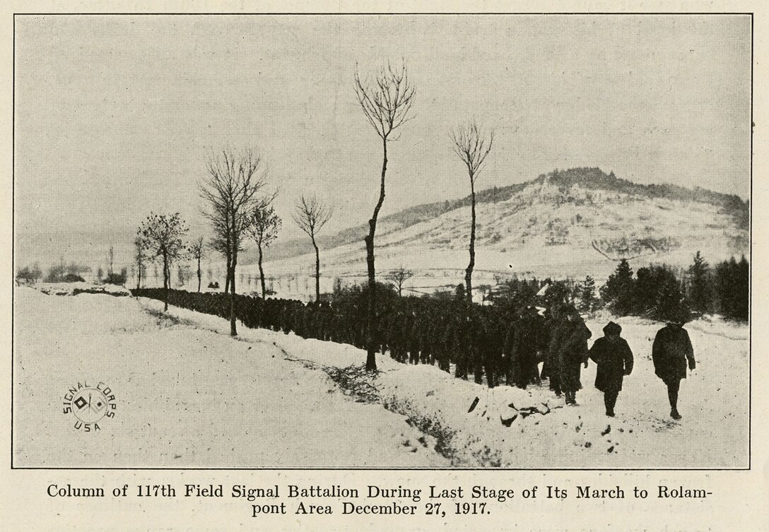 A photograph from the book “the Story of the Rainbow Division” shows soldiers with the Missouri National Guard’s 117th Field Signal Battalion -- part of the 42nd Infantry Division -- making their way through the snowy French countryside in Dec. 1917 during the “Valley Forge Hike.” The troops marched over 60 miless in the snow, from Vaucouleurs to Rolampont, France. Courtesy photo
