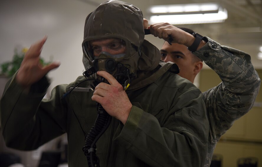 344th ARS aircrew dawns chemical gear