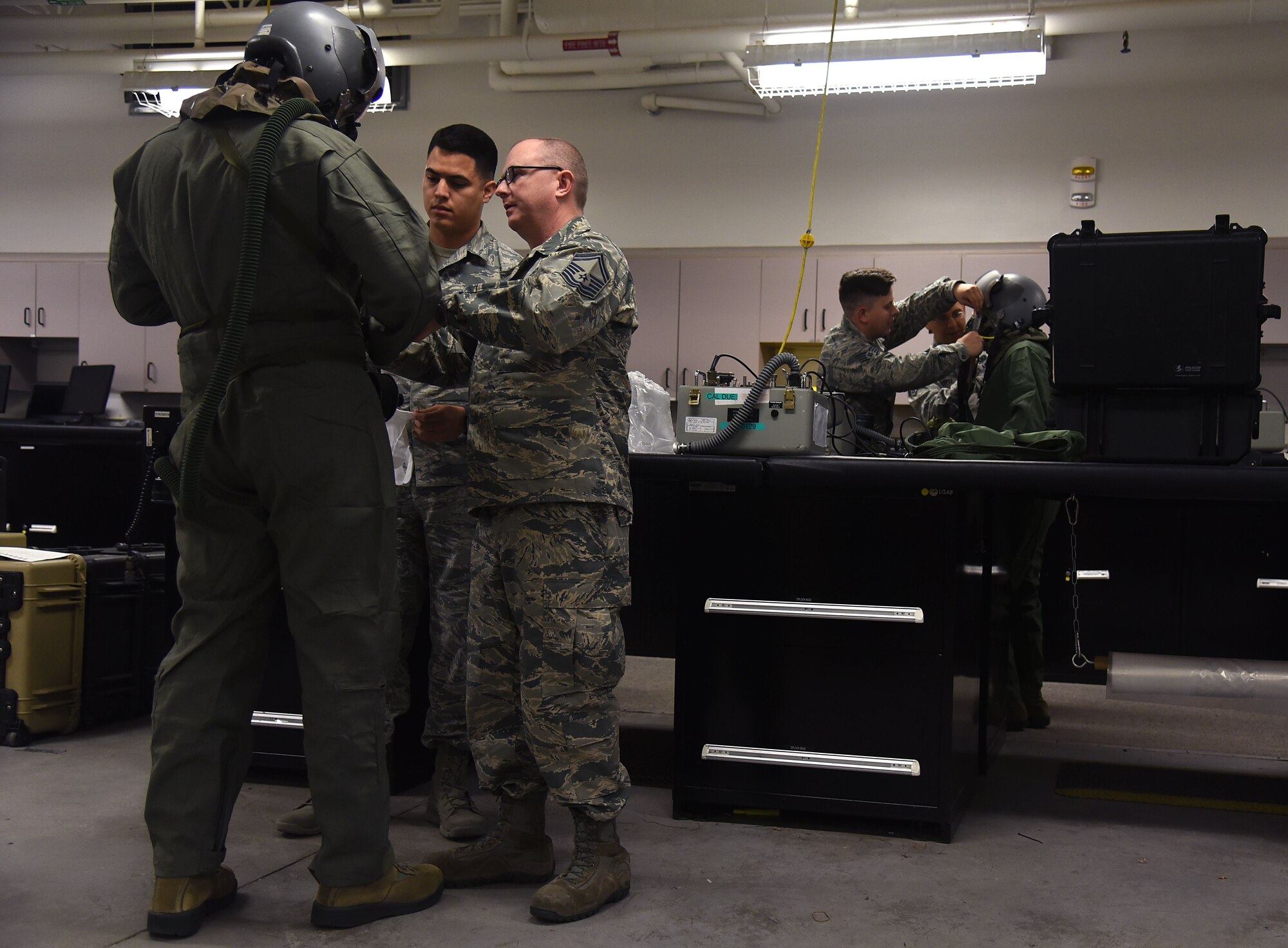 344th ARS aircrew dawns chemical gear