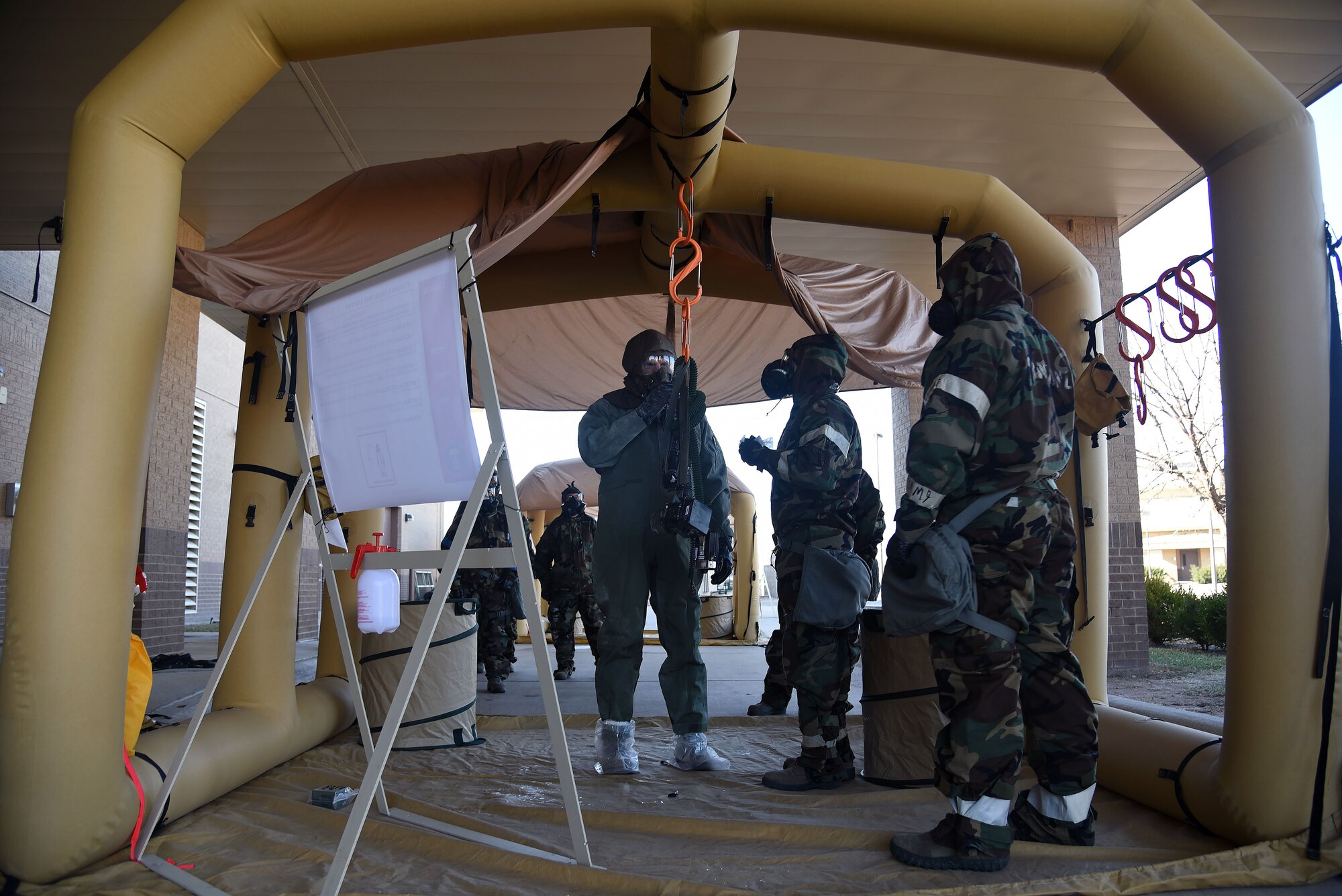 344th ARS aircrew dawns chemical gear