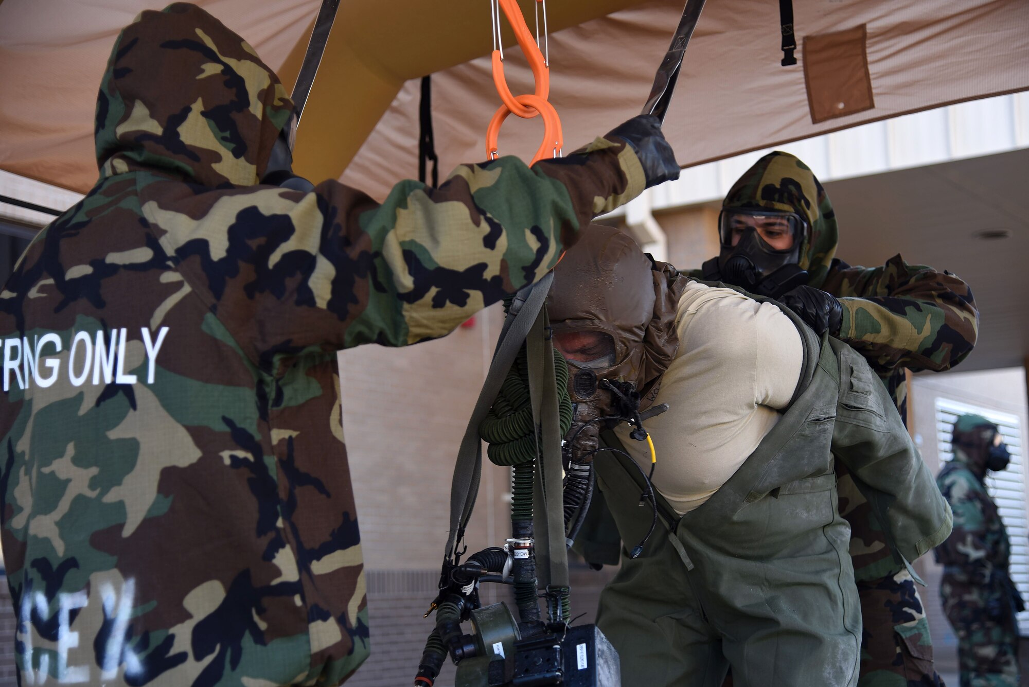 344th ARS aircrew dawns chemical gear