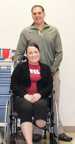 U.S. Air Force Maj. Stephanie Proellochs and her husband, John, before heading for her last physical therapy session before she is fitted for her prosthesis at Walter Reed Medical Center, Nov. 8, 2017. (U.S. Air Force photo by Karina Luis)