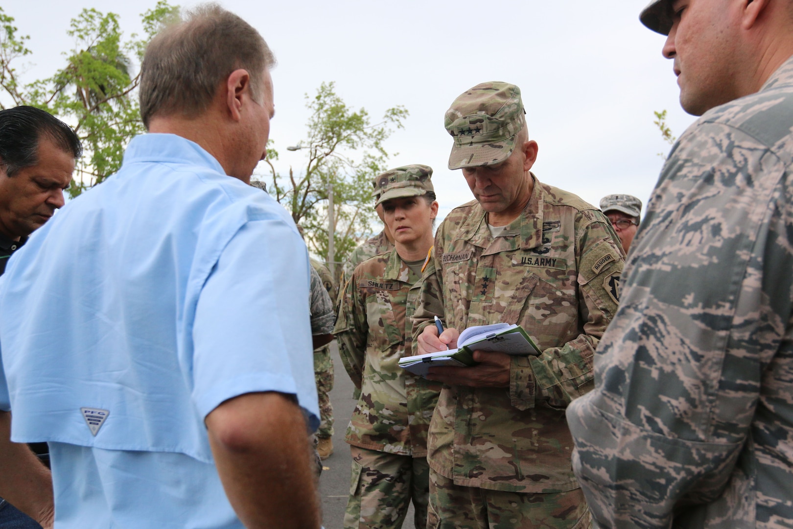 Lt. Gen. Jeffrey Buchanan, commanding general, Joint Force Land Component Command, visits Ramón Luis Rivera, Jr., the mayor of Bayamon, Puerto Rico, to assess the emergency relief efforts needed in Puerto Rico, Oct. 6, 2017. The Department of Defense is supporting the Federal Emergency Management Agency in helping those affected by Hurricane Maria to minimize suffering as part of the overall whole-of-government response efforts. Buchanan is commander of U.S. Army North (Fifth Army) at Joint Base San Antonio-Fort Sam Houston.