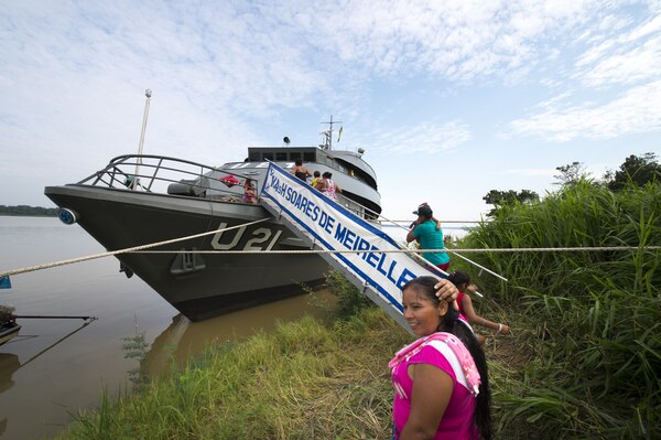 Local villagers board the Brazilian hospital ship.