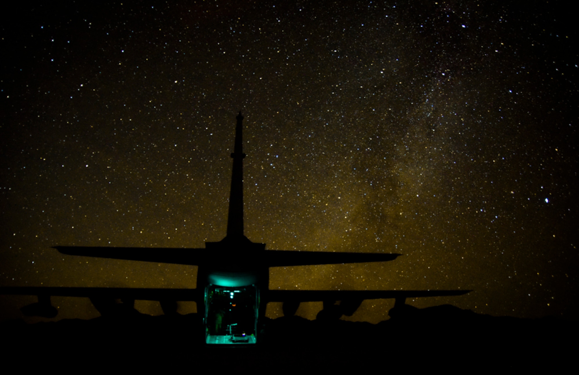 Air Commandos assigned to the 1st Special Operations Squadron Logistic Readiness Squadron, Hurlburt Field, Florida, board an MC-130H Combat Talon II, assigned to the 14th Weapons Squadron, after establishing a forward arming and refueling point during Coyote Freedom 401, Dec. 12, 2017, at the Nevada Test and Training Range. The MC-130H is a variant of the C-130 Hercules with added in-flight refueling capabilities and improved navigation computers that allow it to land or airdrop on small, unmarked runways with pinpoint accuracy. (U.S. Air Force photo by Airman 1st Class Andrew D. Sarver/Released)
