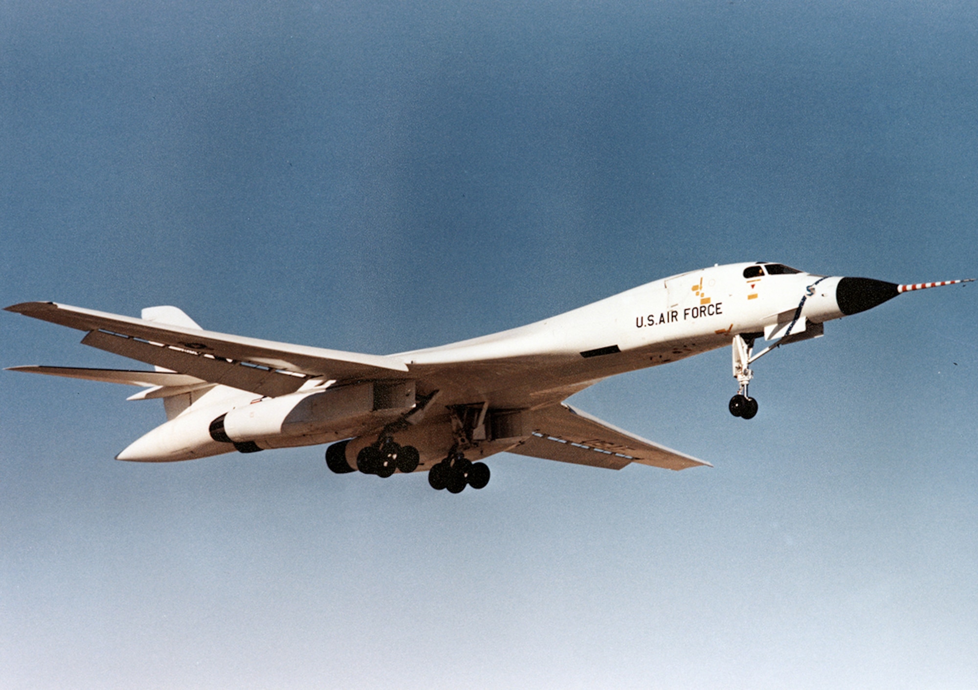On December 23, 1974 the Rockwell International B-1A Lancer made its first flight, from Air Force Plant 42 in Palmdale and landed at Edwards. The aircraft commander was Rockwell test pilot and retired USAF Colonel Charles Bock, Jr. with USAF pilot and B-1 JTF director Col Emil “Ted” Sturmthal, and flight test engineer Richard Abrams. The 70-minute, 250-mile flight path was within reach of the Rogers Dry Lake runways during which basic flight evaluation was conducted.