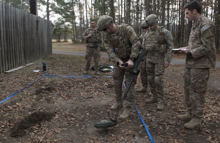 Senior Airman Matthew Koser, 628th Civil Engineer Squadron Explosive Ordnance Disposal technician performs a reconnaissance during the EOD Olympics Dec. 15, 2017.