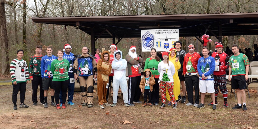 Runners pose for a photo after the Chief’s 5K Fall Fun Run at Little Rock Air Force Base, Ark., Dec. 18, 2017.