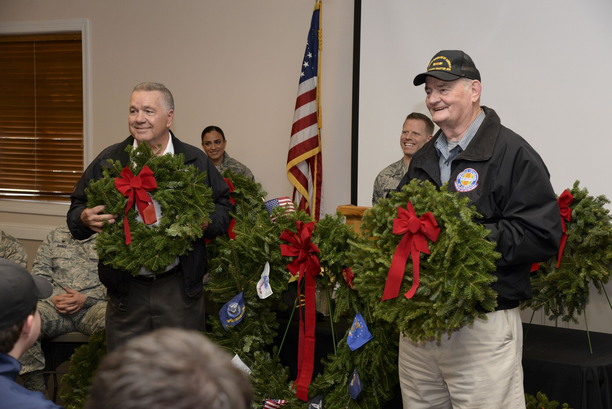 From left, Joe Startt and Paul Davis, both Vietnam War veterans, were recognized for their contributions to Delaware veterans’ organizations Dec. 14, 2017, at the Camden-Wyoming Fire Company in Camden-Wyoming, Del. The two Delaware residents raise awareness for the needs of veterans and their families throughout the state. (U.S. Air Force photo by Staff Sgt. Aaron J. Jenne)