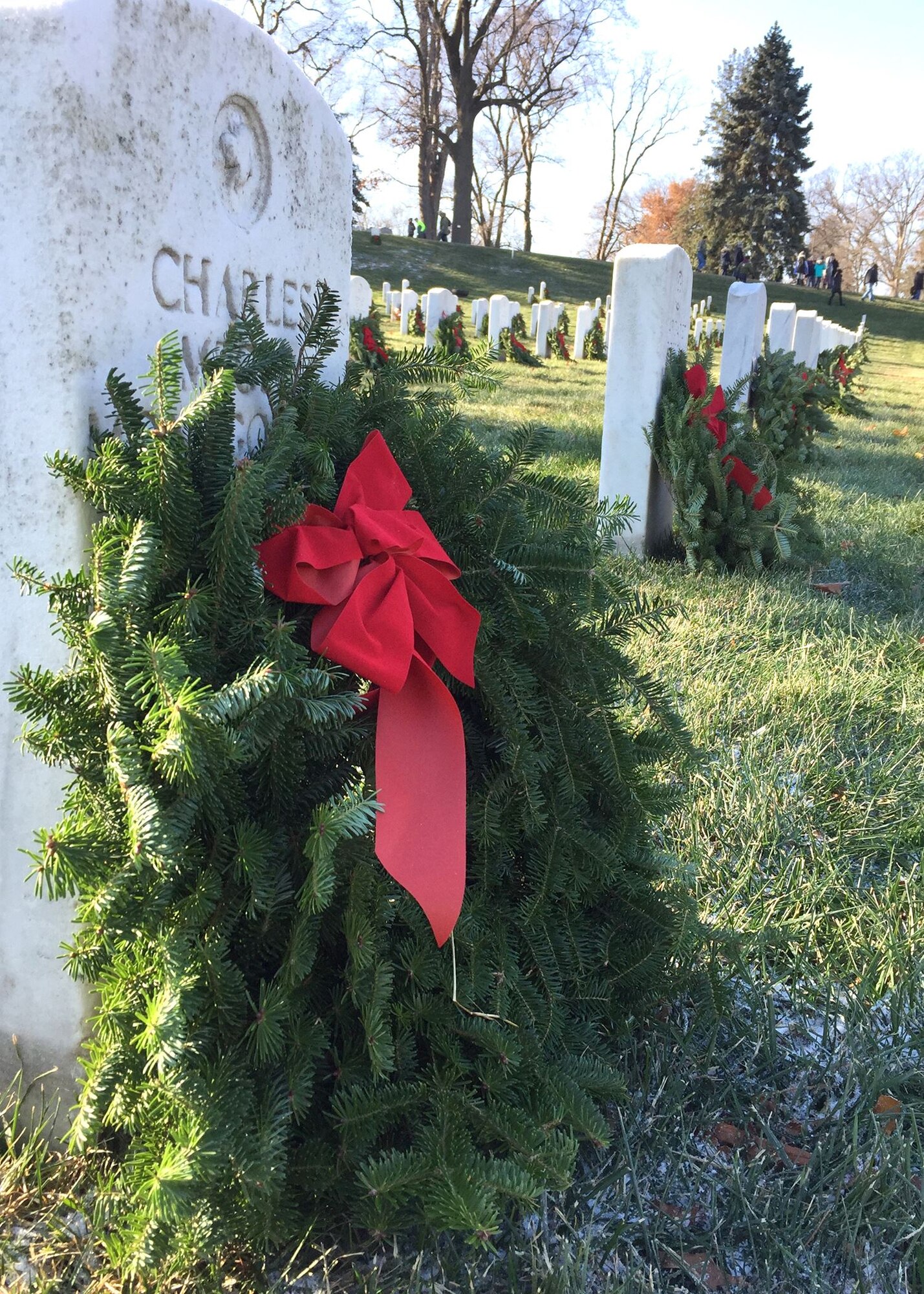 Remembrance wreaths adorn the gravesites of fallen service members Dec. 16, 2017, at Arlington National Cemetery in Arlington, Va. Tens of thousands of volunteers placed the wreaths during National Wreaths Across America Day. (U.S. Air Force photo by 2nd Lt. Natasha O. Mosquera)