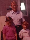 U.S. Air Force Staff Sgt. Ronald Hoelle with his two children at Chanute Air Force Base, Illinois, where he instructed. (Courtesy photo used with permission.)