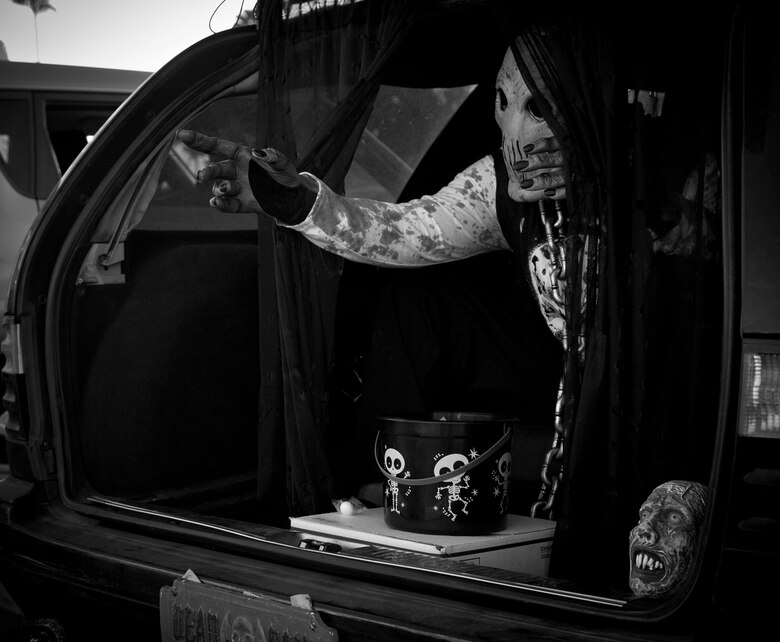 Active duty military members, DoD personnel and their families enjoy candy, games, and Halloween decorations during the third annual Trunk or Treat event held on the parade deck aboard Marine Corps Air Station Yuma, Ariz., Oct. 26, 2017. The event is a collaborative effort between the Alcohol Abuse Prevention Program, the Sexual Assault Prevention Program, the Drug Demand Reduction Program, and Marine Corps Family Team Building in honor of Red Ribbon Week. (U.S. Marine Corps photo by Lance Cpl. Joel Soriano)