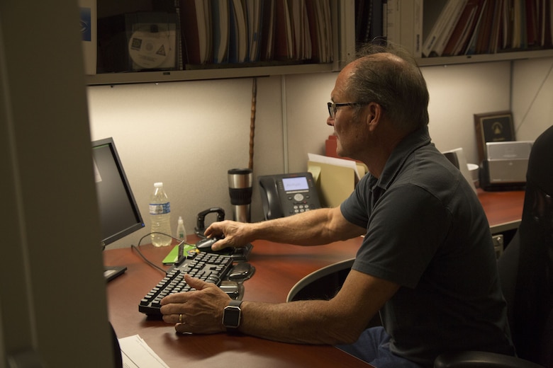 William “Bill” Shepherd, an environmental specialist with Marine Corps Air Station Yuma, Ariz. environmental section, performs his duties on Oct. 16, 2017. Shepherd is in charge of making sure everyone on station has safe drinking water and it is environmentally safe. He will retire on Oct. 19, 2017 after faithfully serving the U.S. government for 32 years. (U.S. Marine Corps photo by Lance Cpl. Sabrina Candiaflores)