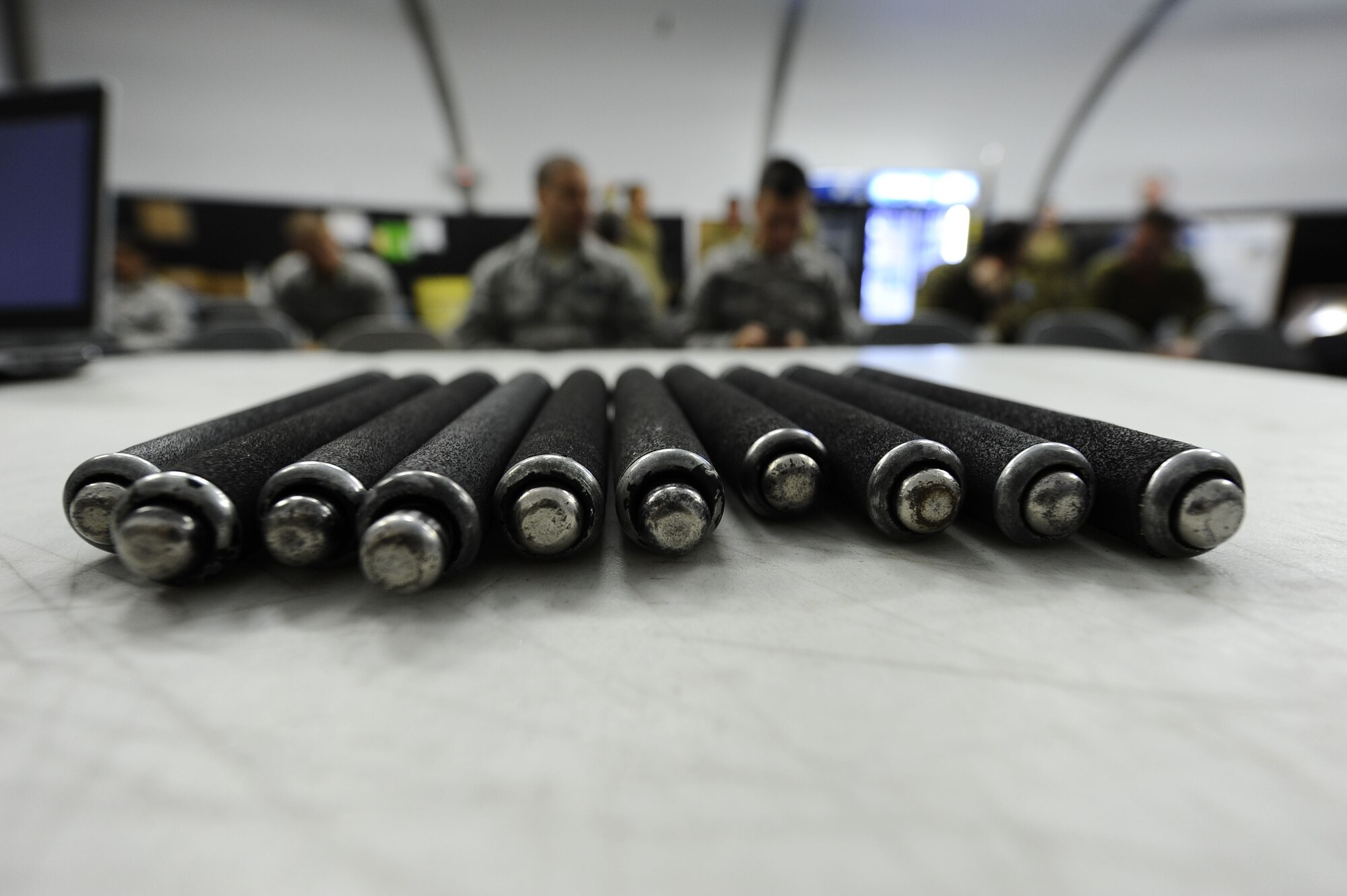 Members of the 380th Expeditionary Security Forces Squadron at Al Dhafra Air Base, United Arab Emirates sit in ASP Baton training class Dec. 1, 2017. Security Forces members protect and secure military installations as well as the personnel, equipment and resources on the installation. 
 (U.S. Air Force photo by Tech. Sgt. Anthony Nelson Jr.)