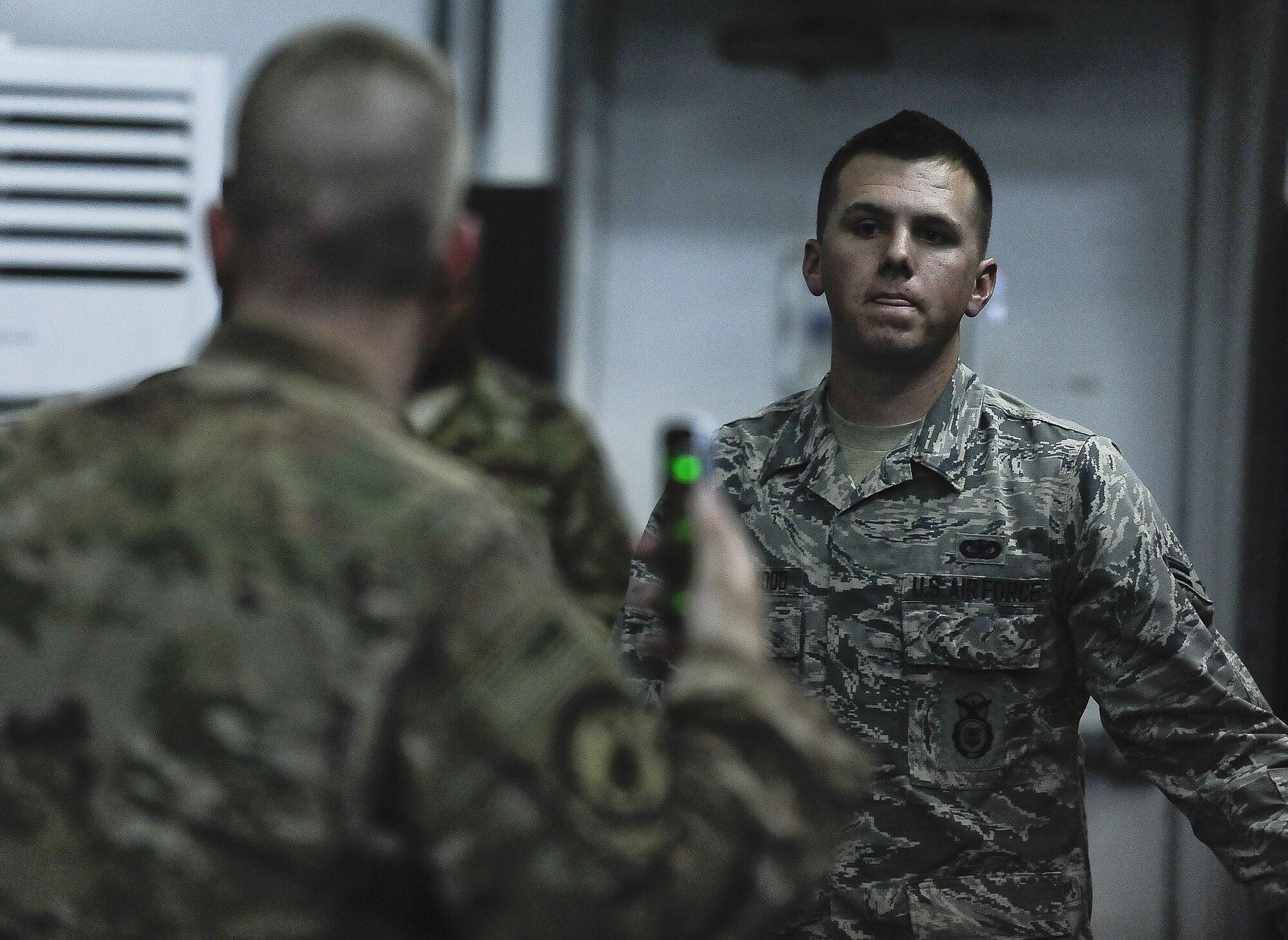 Airman 1st Class Preston Underwood, 380th Expeditionary Security Forces, performs a one minute round of physical exercise before the "Redman" portion of ASP Baton training at Al Dhafra Air Base, United Arab Emirates Dec. 1, 2017. Security Forces members are responsible for the safety of personnel and assets on the installation. 
 (U.S. Air Force photo by Tech. Sgt. Anthony Nelson Jr)