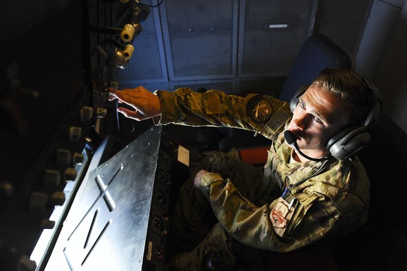 Senior Airman Adam Stickney, an air refueling operator assigned to the 908th Expeditionary Air Refueling Squadron conducts a system check prior to an air refueling mission over Iraq, Nov. 29, 2017. The refueling mission of the KC-10 provides direct support to U.S. and Coalition aircraft in order to deliver decisive airpower and defend the region. 
 (U.S. Air Force photo by Tech. Sgt. Anthony Nelson Jr.)