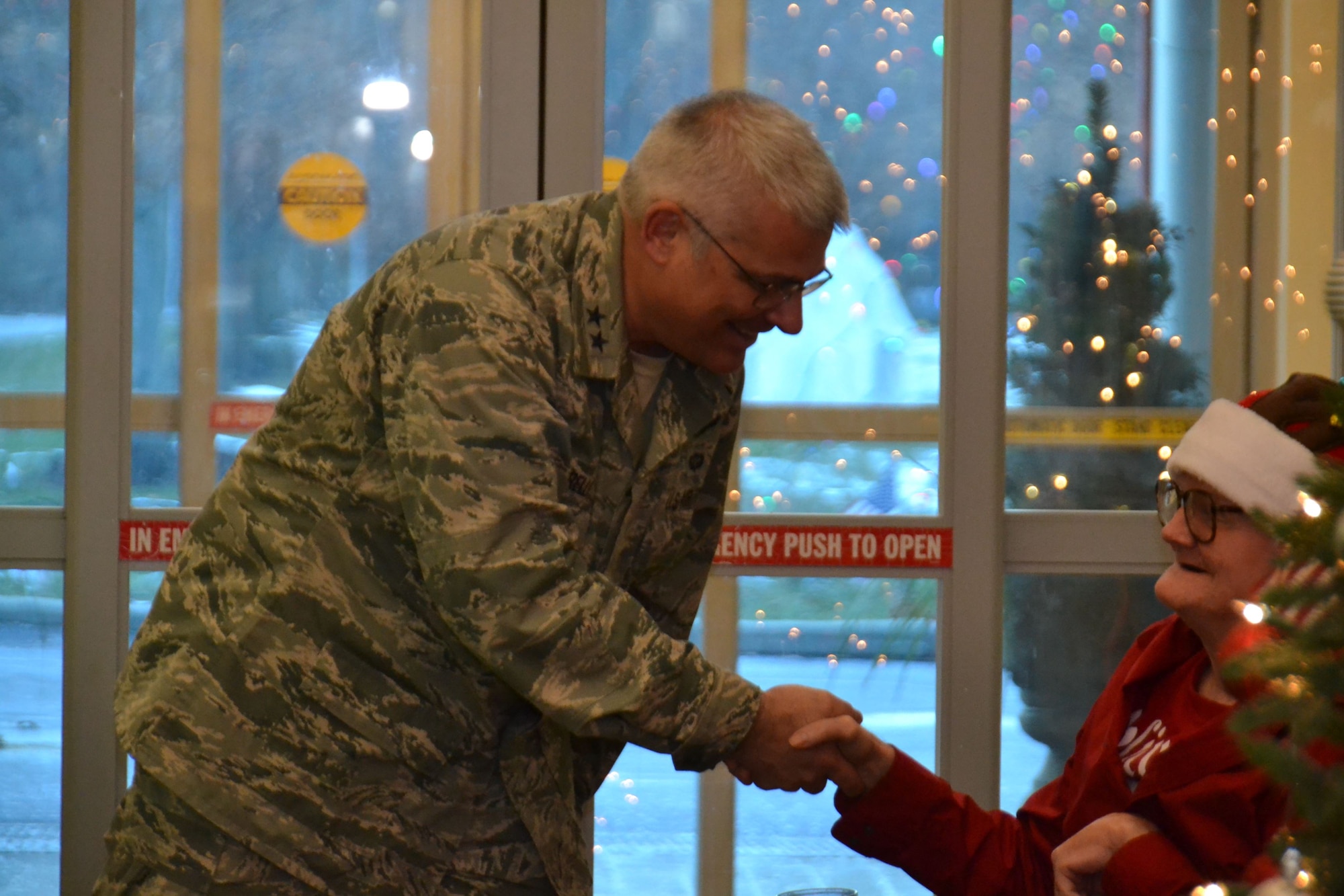 Maj. Gen. Tony Carrelli, Pennsylvania's adjutant general and head of the Pennsylvania Department of Military and Veterans Affairs (DMVA), greets a resident of the Delaware Valley Veteran’s Home, Philadelphia, during a holiday-themed visit by Pa. National Guardsmen Dec. 14. 2017. Airmen and Soldiers of the Commonwealth not only play a critical role operationally, but also as ambassadors for the U.S. military. (U.S. Air National Guard photo by Tech. Sgt. Andria Allmond)