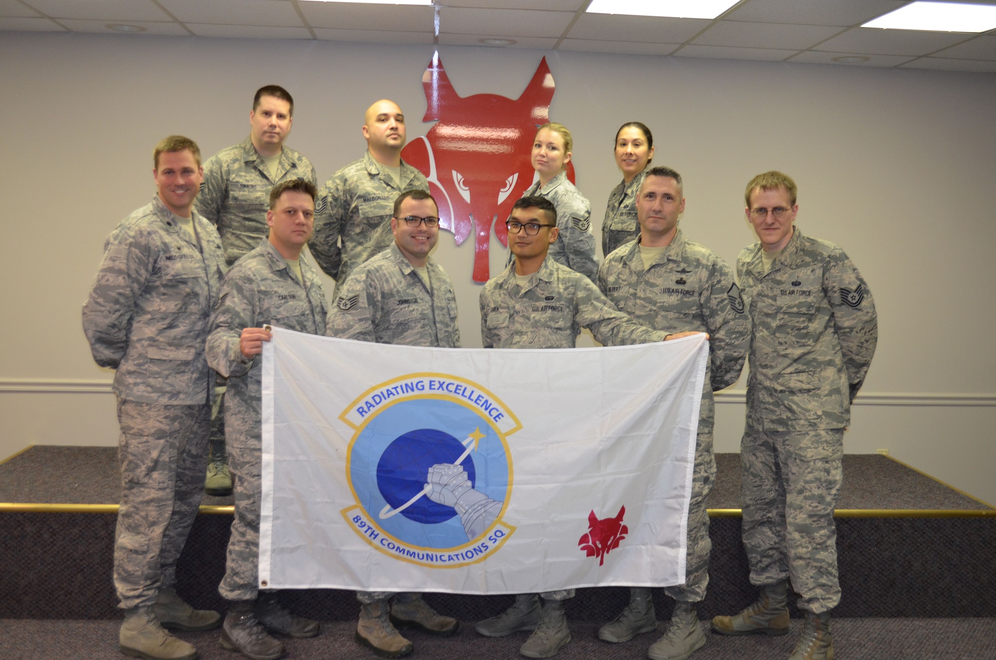 Airmen with the 89th Communication Squadron pose for a group photo. (Courtesy Photo)