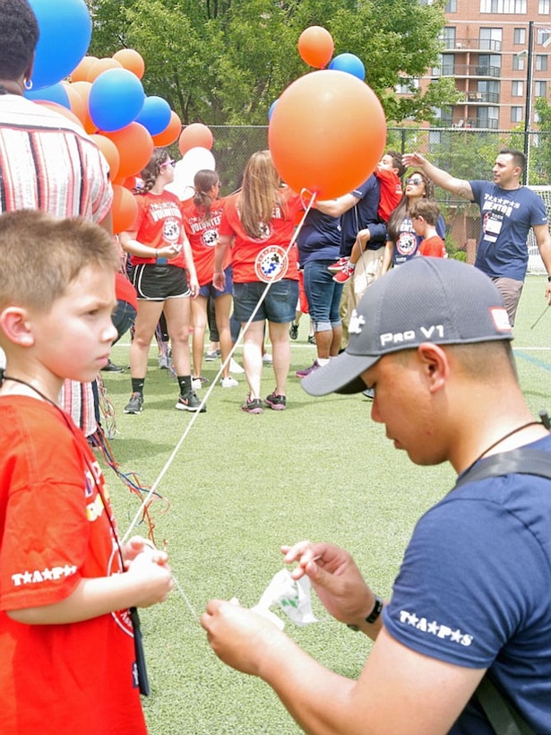 Army Capt. Joseph Quenga volunteers with TAPS