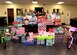 Col. Julian Cheater, 432nd Wing/432nd Air Expeditionary Wing commander, Chief Master Sgt. Jaime Auger, 432nd WG/432nd AEW command chief, and members of the Creech Human Performance Team, presented holiday gifts to representatives from Indian Springs, Dec. 18, 2017, at Creech Air Force Base, Nev. The donated gifts go to aid more than 30 families living below the poverty line. (U.S. Air Force photo/Senior Airman Christian Clausen)