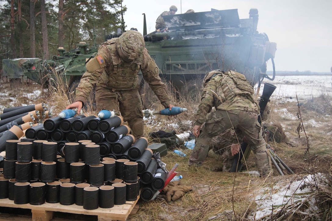 Soldiers fire an 81-millimeter and 120-millimeter mortars.