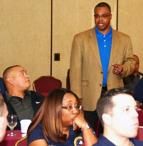 Army veteran Charles Newby, a facilitator assigned to the Navy’s 21st Century Sailor office in Norfolk, Va., speaks with officers and chief petty officers of Navy Recruiting District San Antonio about Operational Stress Control during a district training meeting held at the Crowne Plaza Hotel in Austin Dec. 19. More than 250 recruiters, support personnel and their spouses attended the training where they were provided with support networks, programs, resources, training, and skills needed to overcome adversity and thrive.
