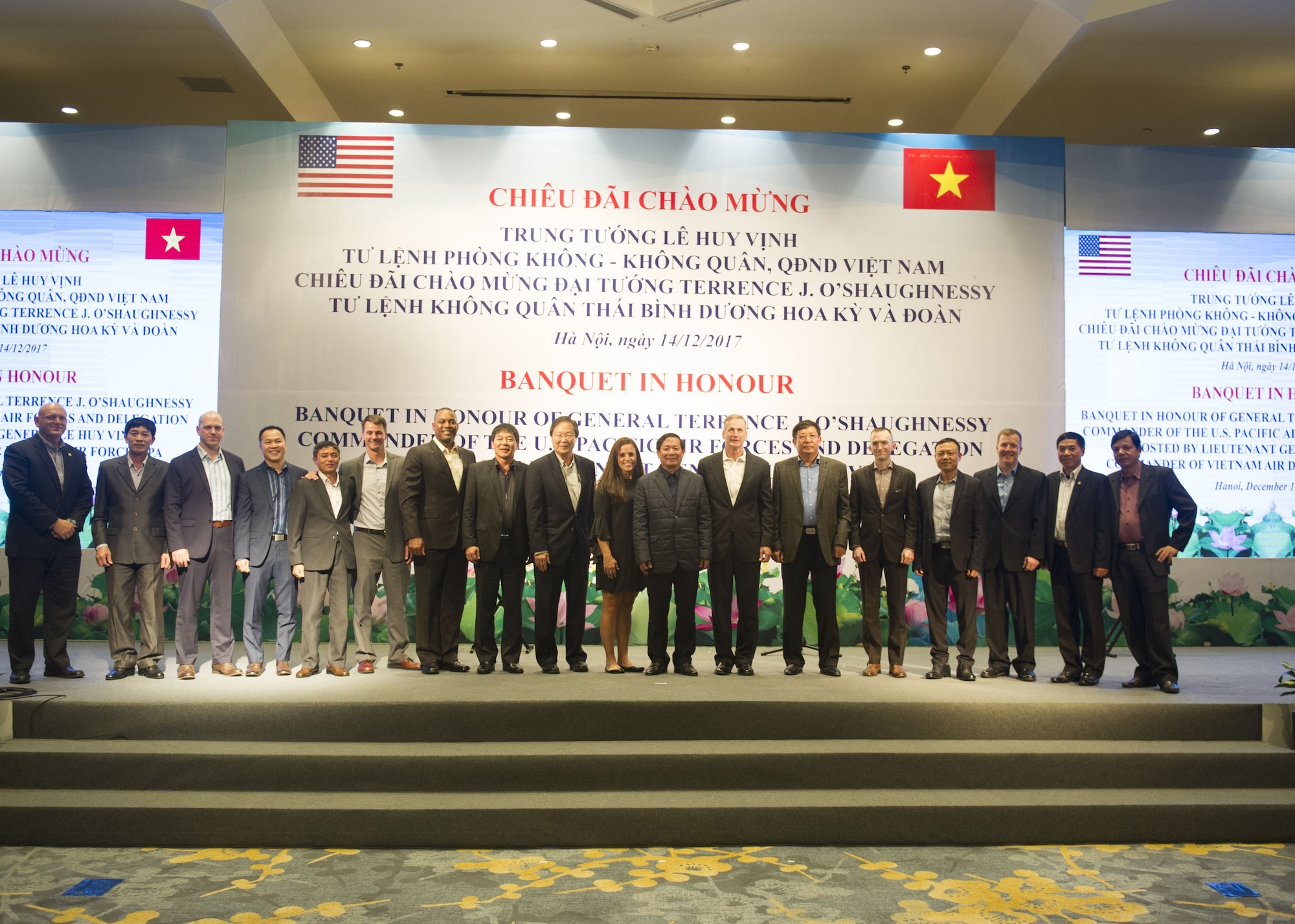 Pacific Air Forces and Vietnamese Air Defense-Air Force (ADAF) staff pose for a photo following a dinner hosted by the ADAF in Hanoi, Vietnam, Dec. 14